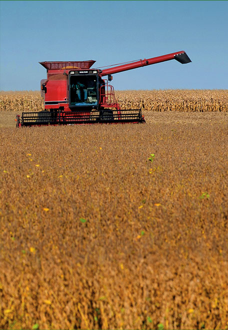 Photo of an Iowa farmer harvesting crops